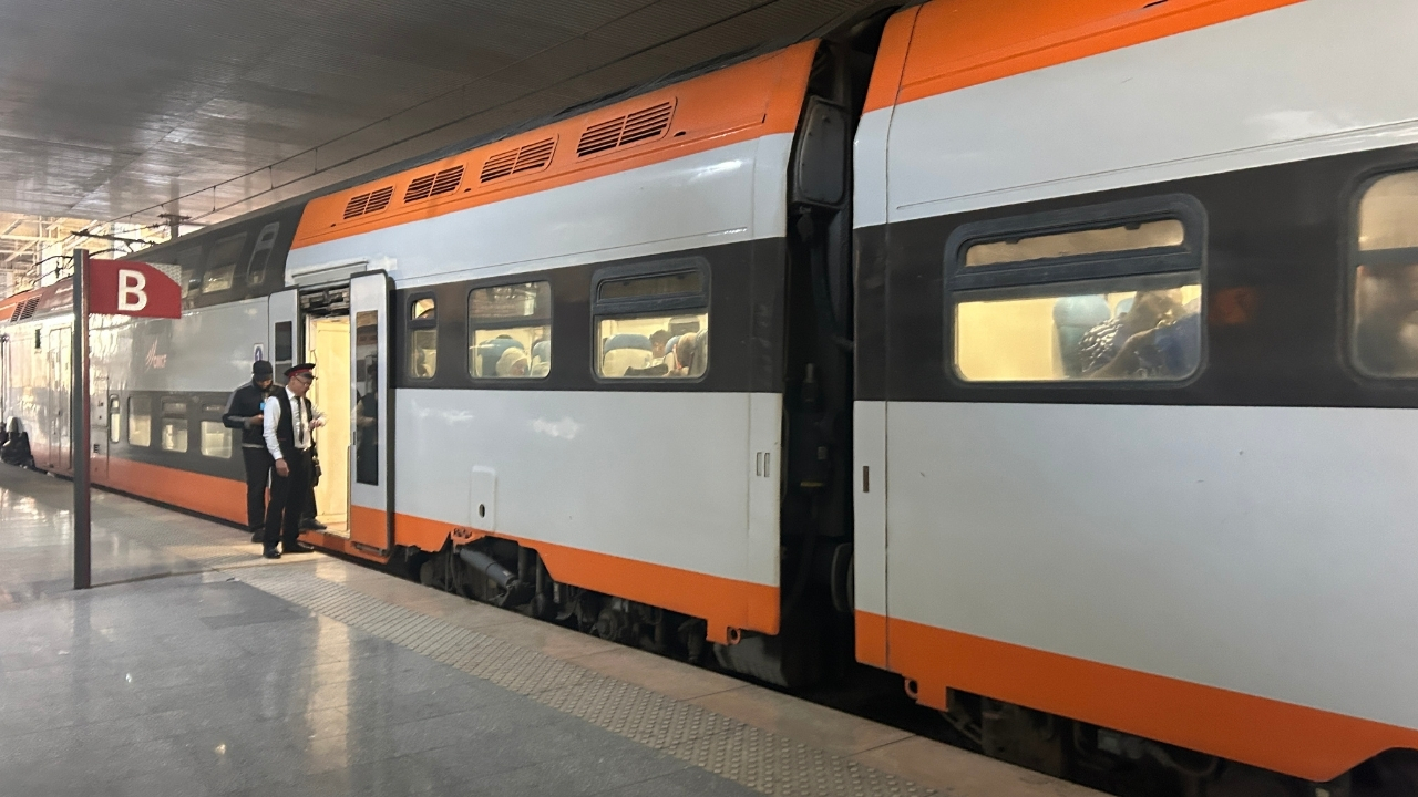 Moroccan ONCF train parked at the platform—popular route from Marrakech to Casablanca.